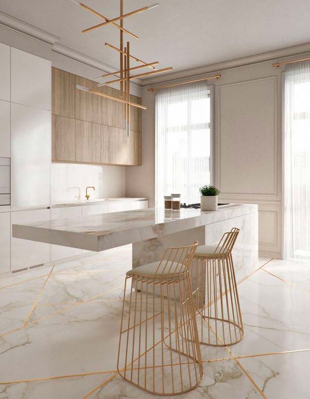 Décoration d'une cuisine design en marbre blanc et dorée effet kintsugi