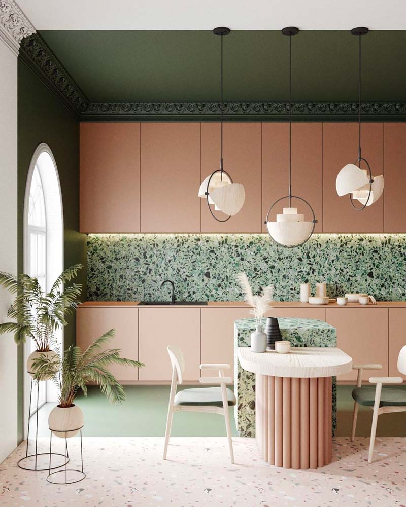 Cuisine rétro pop en terrazzo vert mouchetée noir, vert et blanc avec du mobilier minimaliste