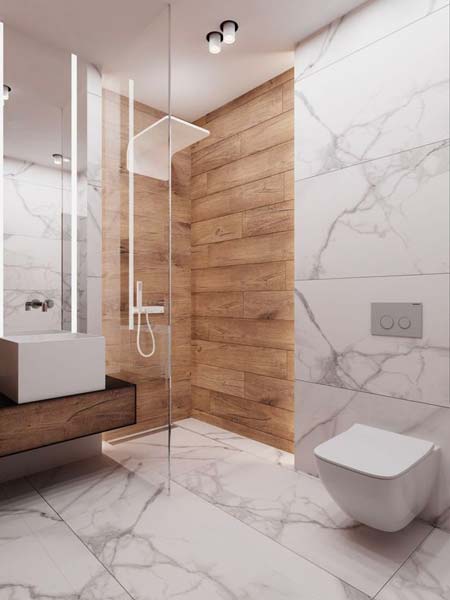 Salle de bain design qui mélange le marbre blanc et un carrelage effet bois