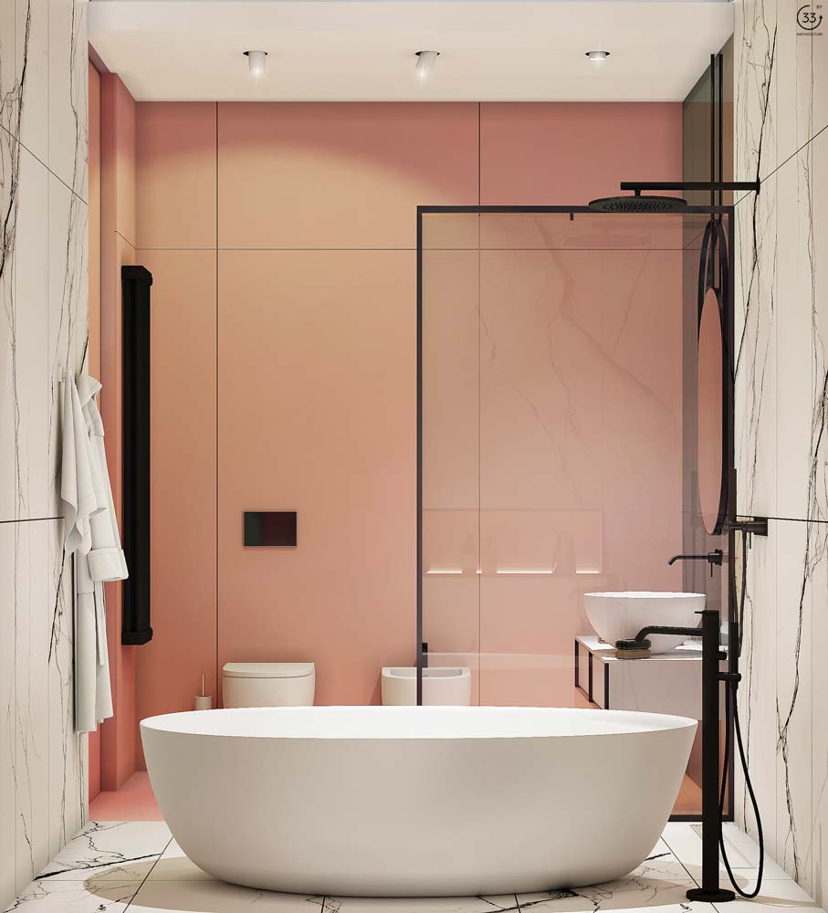 Une salle de bain blanche et vieux rose avec du marbre et de la robinetterie noire