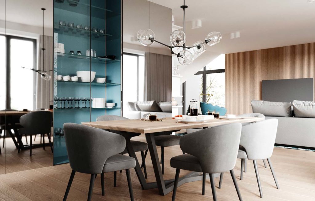 Un grand salon et salle à manger avec table et chaise, canapé et télévision sur un mur en bardage intérieur en bois, et une armoire vitrée centrale au fond couleur blue sky