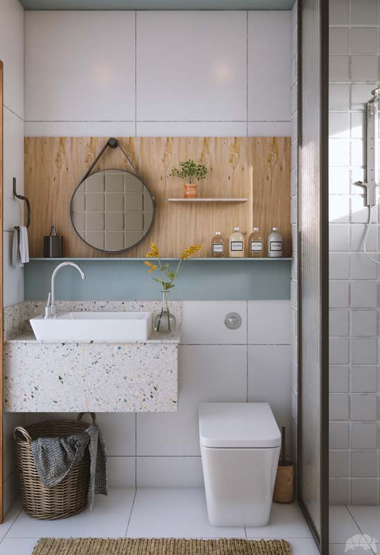 Une salle de bain lumineuse blanche avec des touches de bois clair et une petite bande de peinture blue sky