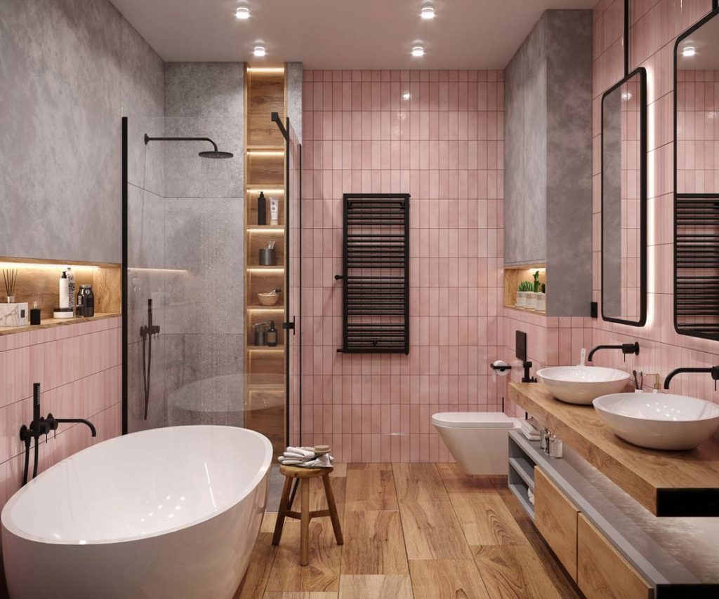 Une salle de bain avec des murs en zellige rose, un plancher, des meubles en bois, du revêtement gris imitation béton et de la robinetterie noire