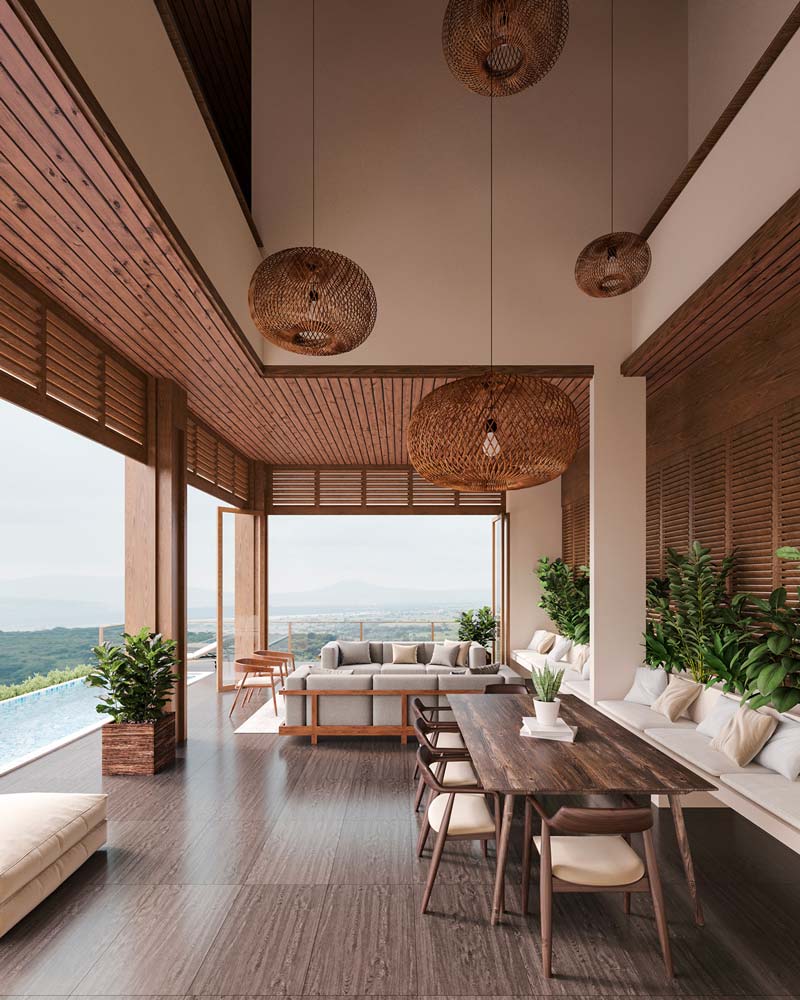 Un salon de jardin extérieur sur une grande terrasse en bois