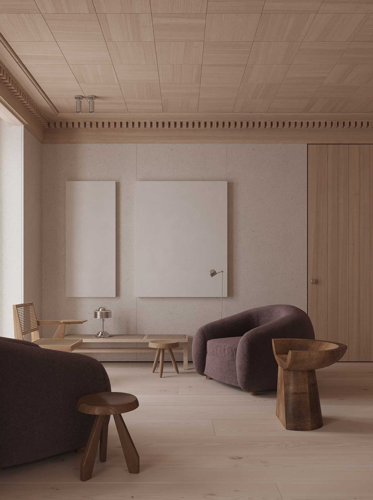 Des fauteuils en velours dans un salon chic avec du bois blond au plafond