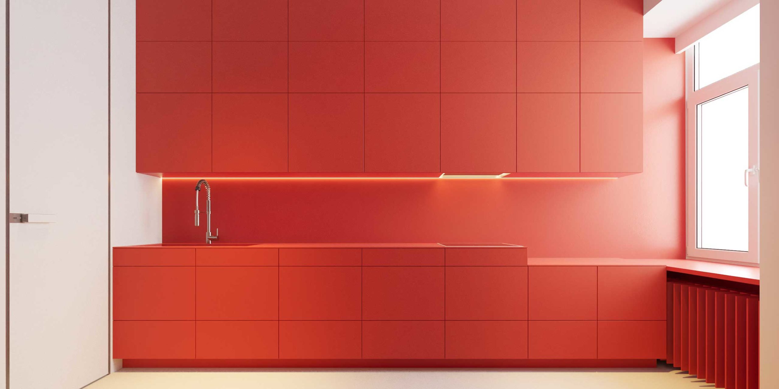 Une cuisine minimaliste dotée de nombreux rangements avec des couleurs vives