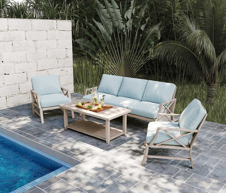 Un petit salon outdoor blue sky au bord d'une piscine pour profiter du jardin