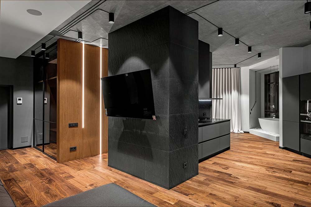 un loft masculin, chêne, ardoise et béton