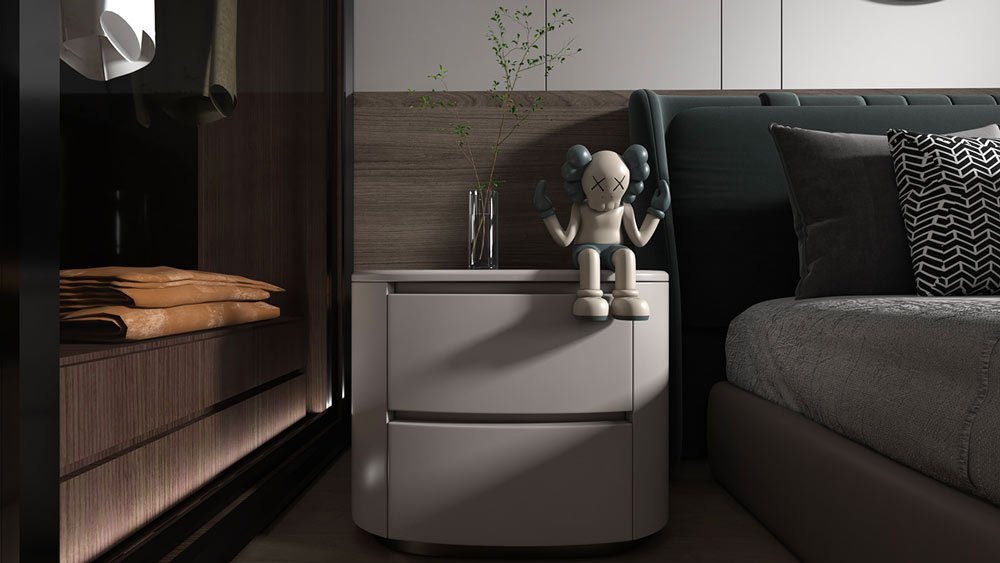 Une chambre cocooning décorée d'un art toys kaws assis sur la table de chevet