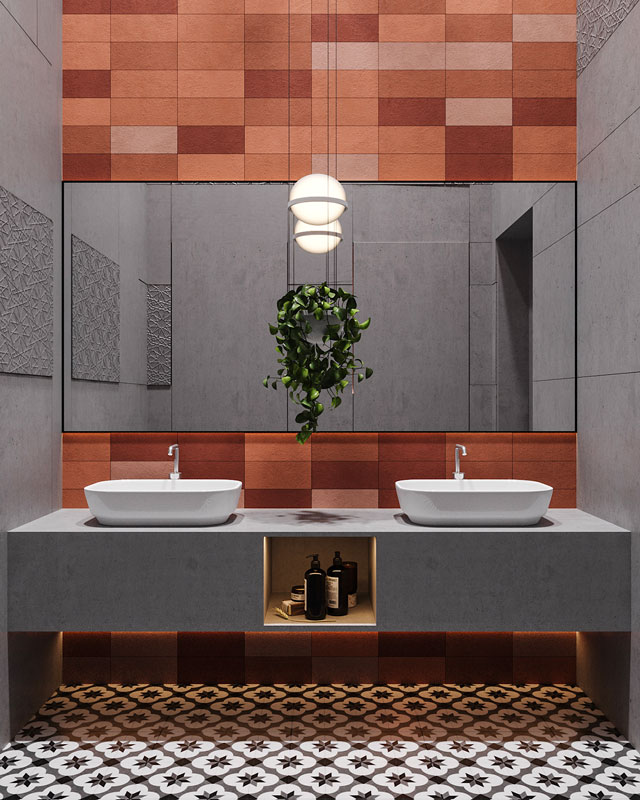 Une salle de bain de couleur terracotta et des carreaux de ciment