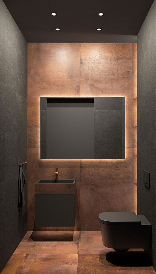 Des toilettes avec un revêtement cuivre oxydé sur un mur et sur le sol, le mobilier, les murs et le plafond ont un revêtement noir